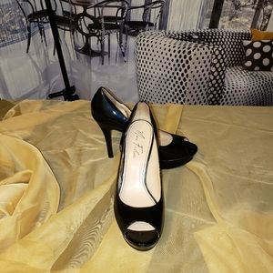 Black Marc Fisherpatent leather  Dress peep toe pump. Size 9M